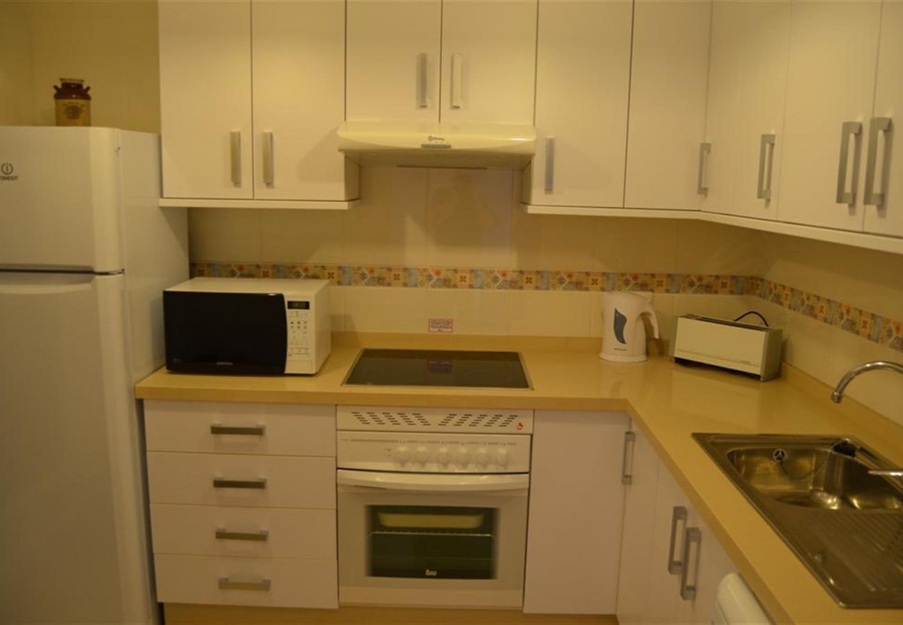 Cocina moderna con electrodomésticos modernos - Resort Choice