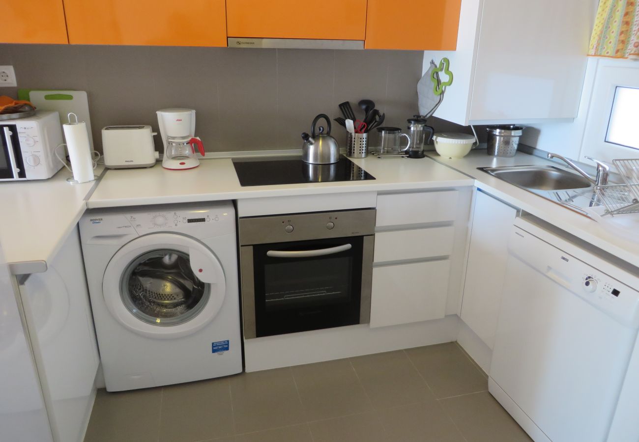 Apartamento con cocina con electrodomésticos modernos - Resort Choice