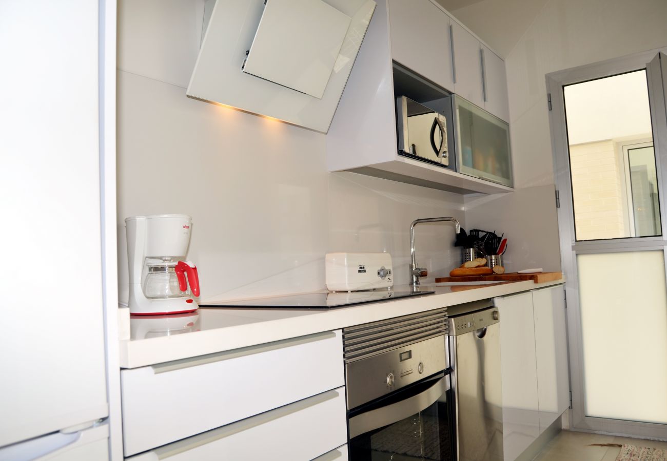 Spacious and modern kitchen of Santiago de la Ribera apartment