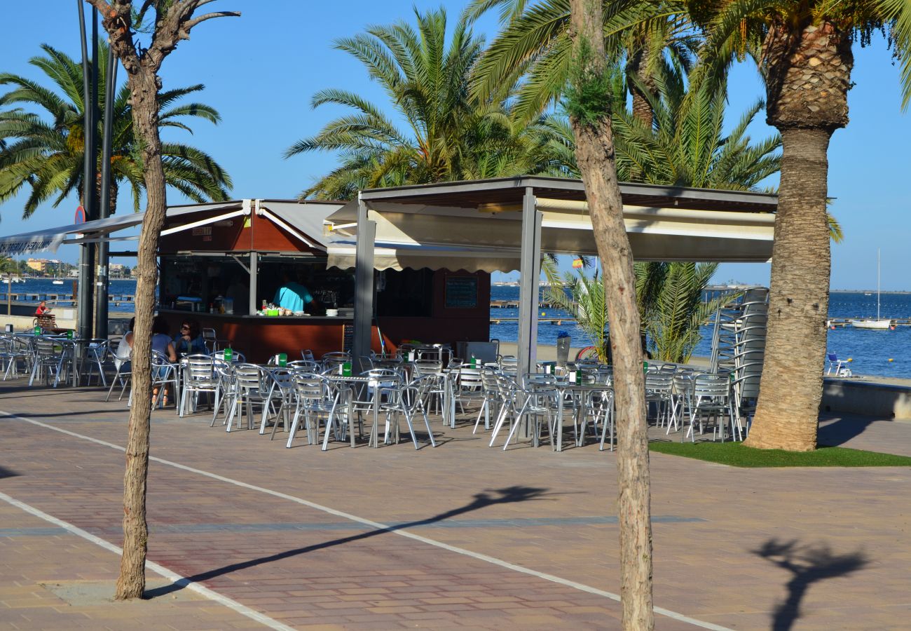 Santiago de la Ribera promenade with lots bars