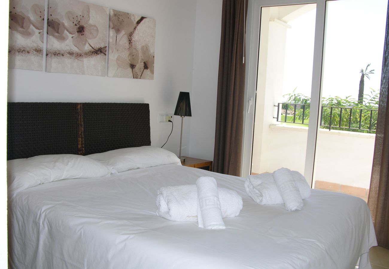 Beautiful and spacious bedroom of Hacienda Riquelme apartment