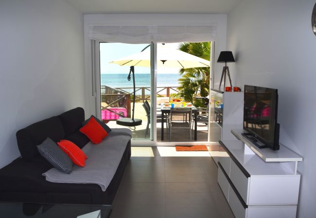 Modern living room equipped with T.V and comfortable furniture